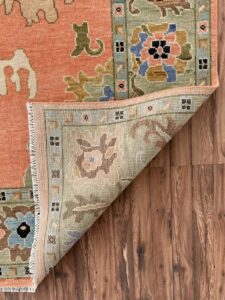 Vibrant Coral Floral Handcrafted Traditional Rug with Decorative Border